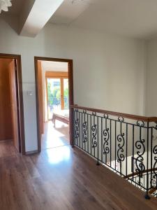 an empty room with a staircase and a door at EPISKOPI VILLA, Luxury 4 Bedroom with Pool - Limassol in Limassol