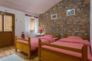 Postel nebo postele na pokoji v ubytování Holiday home in Polje - Krk - Insel Krk 36486