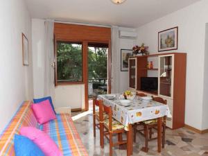 A seating area at Apartments in Bibione 24609