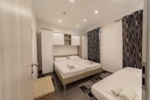 Posteľ alebo postele v izbe v ubytovaní Apartment in Starigrad-Paklenica 36685