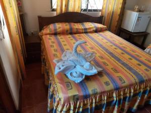 Postel nebo postele na pokoji v ubytování Coco Bay Villa