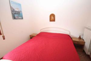 Posteľ alebo postele v izbe v ubytovaní Apartments in Rosolina Mare 25011