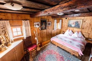 Łóżko lub łóżka w pokoju w obiekcie Holiday Homes in Rennweg am Katschberg 47