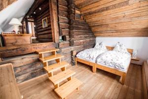 Łóżko lub łóżka w pokoju w obiekcie Holiday Homes in Rennweg am Katschberg 47