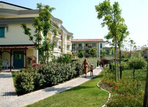 A garden outside Apartments in Caorle 24705