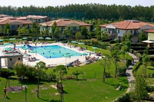 The swimming pool at or close to Apartments in Caorle 24705 Még 6 kép