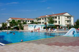 The swimming pool at or close to Apartments in Caorle 24705