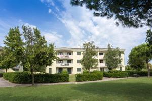 A garden outside Apartments in Caorle 24705