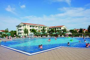 The swimming pool at or close to Apartments in Caorle 24705