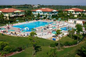 The swimming pool at or close to Apartments in Caorle 24705