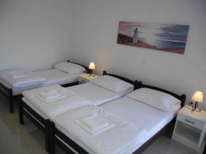 Postel nebo postele na pokoji v ubytování Apartments in Crikvenica 30464