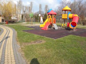 a park with a playground with a slide at Apartments in Szantod/Balaton 35823 in Szántód