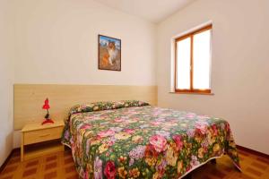 
Letto o letti in una camera di Holiday home in Lignano 21664
