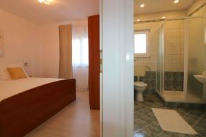 Koupelna v ubytování Holiday Homes in Porec - Istrien 10234