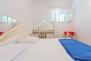 Postel nebo postele na pokoji v ubytování Apartments in Bol/Insel Brac 5963