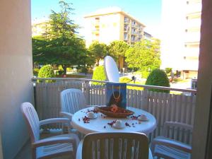 A balcony or terrace at Apartments in Bibione 31270 Még 1 kép