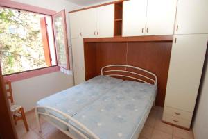 Posteľ alebo postele v izbe v ubytovaní Apartment in Rosolina Mare 24888