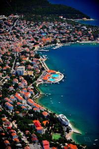 an aerial view of a city with a harbor at Apartment in Selce 5818 in Selce