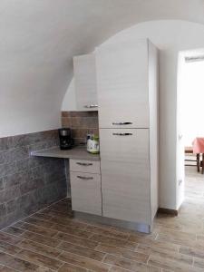 Kuchyňa alebo kuchynka v ubytovaní Apartments in Tremosine - Gardasee 33428