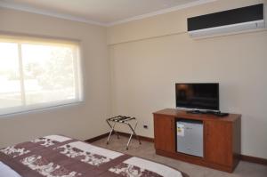 TV a/nebo společenská místnost v ubytování Nuevo Hotel Constitucion