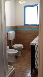 A bathroom at Holiday home in Portopalo 35405