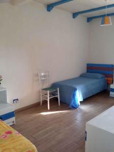 A bed or beds in a room at Holiday home in Portopalo 35405