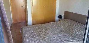 A bed or beds in a room at Apartment in Sant Jordi Castellon 34712