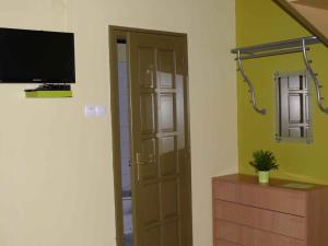 Televízia a/alebo spoločenská miestnosť v ubytovaní Apartment in Balatonkeresztur 35398