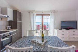 Kuchyň nebo kuchyňský kout v ubytování Apartment in Crikvenica 34970 + 17 fotografií