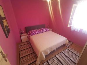 Postel nebo postele na pokoji v ubytování Apartment in Crikvenica 5484