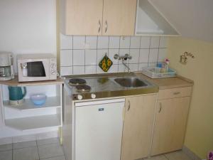 Kuchyňa alebo kuchynka v ubytovaní Apartments in Alsopahok - Balaton 27597