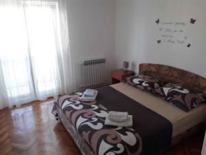 Posteľ alebo postele v izbe v ubytovaní Apartments in Zadar/Zadar Riviera 17889