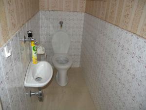 a small bathroom with a toilet and a sink at Holiday home in Balatonfenyves 18432 in Balatonfenyves