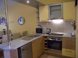 Kuchyň nebo kuchyňský kout v ubytování Apartment in Siofok/Balaton 27559