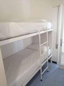 Ένα ή περισσότερα κρεβάτια σε δωμάτιο στο Holiday home in Eraclea Mare 25698