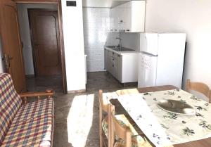 Η κουζίνα ή μικρή κουζίνα στο Apartment in Eraclea Mare 25149