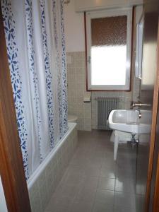 Et badeværelse på Apartments in Eraclea Mare 25611