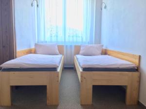 Postel nebo postele na pokoji v ubytování Apartments in Harrachov/Riesengebirge 2300