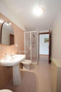 a bathroom with a sink and a toilet and a shower at Apartment Siracusa/Insel Sizilien 23389 in Ognina