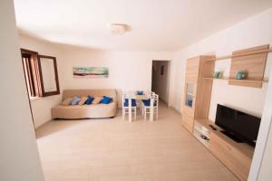 Гостиная зона в Two-Bedroom Apartment in Siracusa I