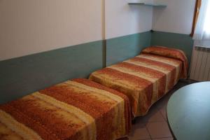 Кровать или кровати в номере Apartment in Rosolina Mare 29520