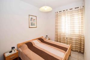 Ein Bett oder Betten in einem Zimmer der Unterkunft Apartment in Pula with Two-Bedrooms 3