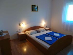 Ένα ή περισσότερα κρεβάτια σε δωμάτιο στο Apartment Valbandon 9