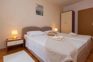 Posteľ alebo postele v izbe v ubytovaní Apartment in Jadranovo with Two-Bedrooms 1