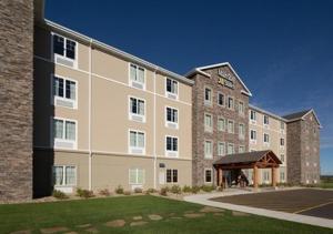 a large building with a gazebo in front of it at MainStay Suites Rapid City in Rapid City