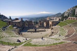 an amphitheater with a mountain in the background at Studio in Letojanni/Sizilien 23302 in Letojanni