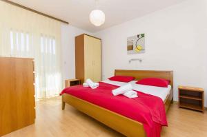 Postel nebo postele na pokoji v ubytování Apartment in Stari Grad - Insel Hvar 6321