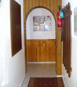 an entrance to a hallway with an archway at Apartment in Mölbling/Kärnten 69 in Althofen