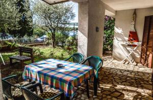 a table and chairs sitting on a patio at Apartment in Pula/Istrien 10862 in Veruda