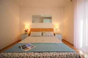 Postel nebo postele na pokoji v ubytování Apartment in Porec - Istrien 10194
